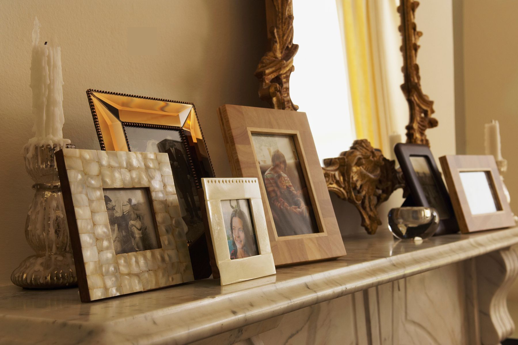 Picture frames on the mantel